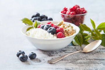 cottage cheese, muesli and fresh fruit for breakfast, selective focus