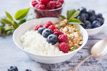 cottage cheese, muesli and fresh fruit for breakfast, selective focus