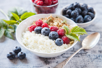 cottage cheese, muesli and fresh fruit for breakfast, selective focus