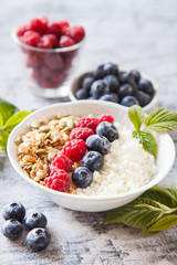 cottage cheese, muesli and fresh fruit for breakfast, selective focus