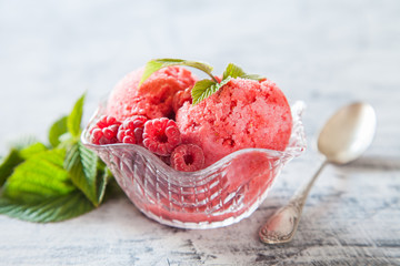 raspberry ice cream with berries, selective focus