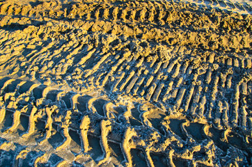 Wheel tracks on a sand in a quarry