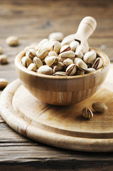 Salth pistachios on the wooden table