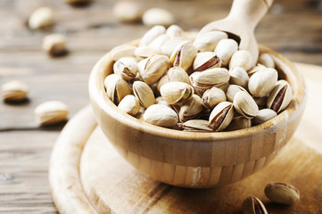 Salth pistachios on the wooden table
