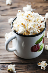 Popcorn on the wooden table