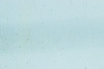 Walls are turquoise. Cement and Concrete