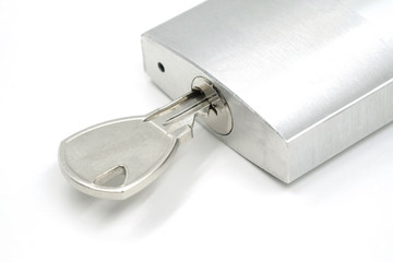locked padlock with the key on it