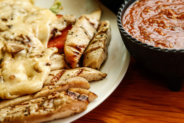 chicken fajitas on with red sauce