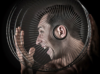 Man listening from the birdcage, concept