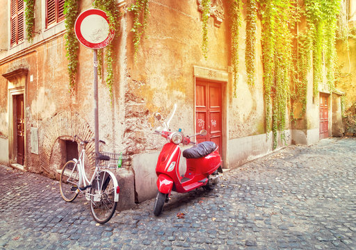 Fototapeta old town italian street with byke in Trastevere with sunshine, Rome, Italy