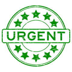 Grunge green urgent rubber stamp