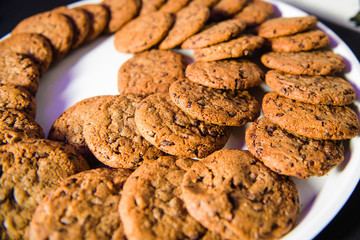 Chocolate cookies served on large white plate