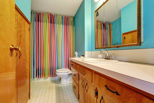 Remodeled Bathroom Interior With Colorful Shower Curtain