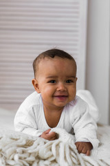 Fototapeta premium Adorable little african american baby boy looking - Black people