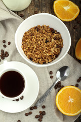 granola and a cup of coffee
