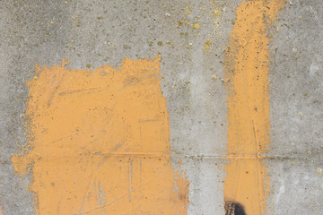 Wall fragment with scratches and cracks