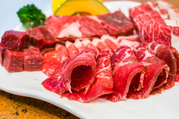 Uncooked raw fresh beef .