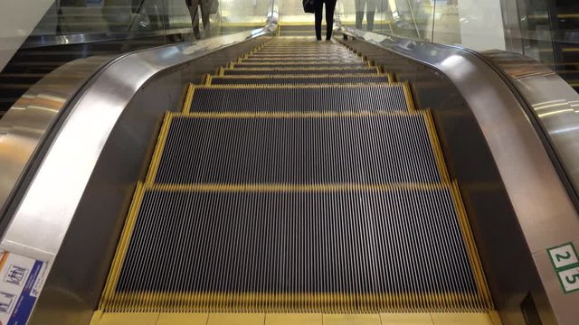 moving escalator up, mecanic, electic, Stair and escalators in a public area. hd footage 1080