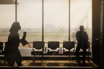 Passenger at the airport, silhouette background