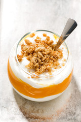 dessert with pumpkin, whipped cream and cookies, top view
