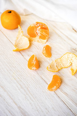 Whole and peeled tangerines