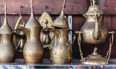 Eastern metal jugs in the shop Arab