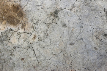 Aged cracked concrete stone plaster wall background and texture