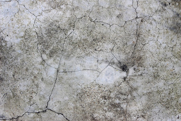 Aged cracked concrete stone plaster wall background and texture