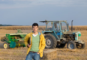 Farmer in field during baling