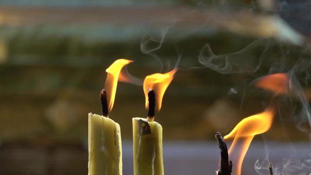 Candles flaming in candlestick