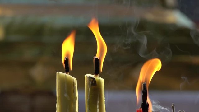 Candles flaming in candlestick