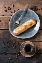 Coffee eclairs over wood
