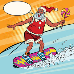 Modern Santa Claus rides on a snowboard