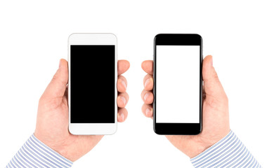Obraz na płótnie Canvas Isolated on white hands holding smartphones with blank screen.