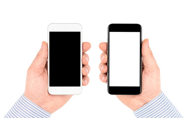 Isolated on white hands holding smartphones with blank screen.