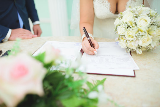 Bride with Pen and Bouquet
