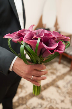 Hand with Violet Bouquet