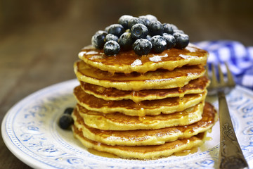 Pancakes with honey and blueberry.Top view.