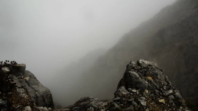 smooth motion along the rocky terrain in misty mountains