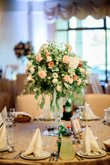 beautiful bunch of gentle flowers in transparent vase