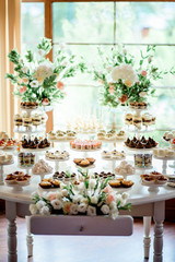 delicious sweet wedding table with a variety of sweets