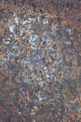 Rusty and worn surface of the iron plate