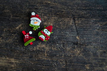Christmas symbols on wooden background