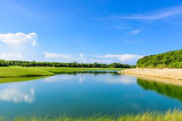 watering the golf course