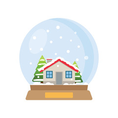 Christmas snow globe with house and trees inside.