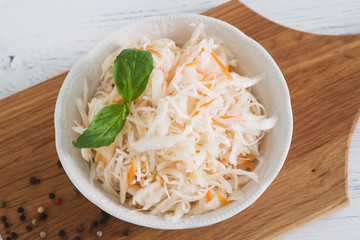 The sauerkraut in ceramic bowl