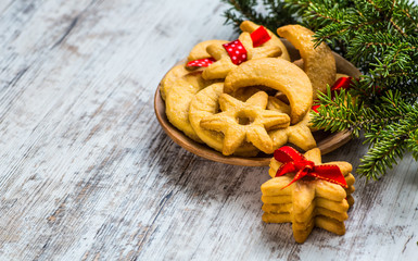 Christmas cookies with ginger decorated with red ribbon