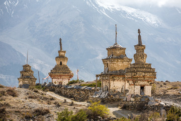 Traditional old Buddhist stupas on Annapurna Circuit Trek in Him