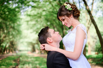 nice portrait of young and beautiful bride and groom