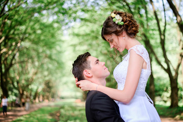 Fototapeta premium nice portrait of young and beautiful bride and groom